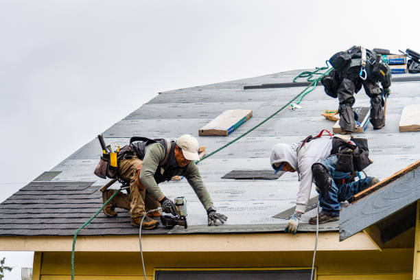 Professional Roof Replacement technician working in Worthington, IN